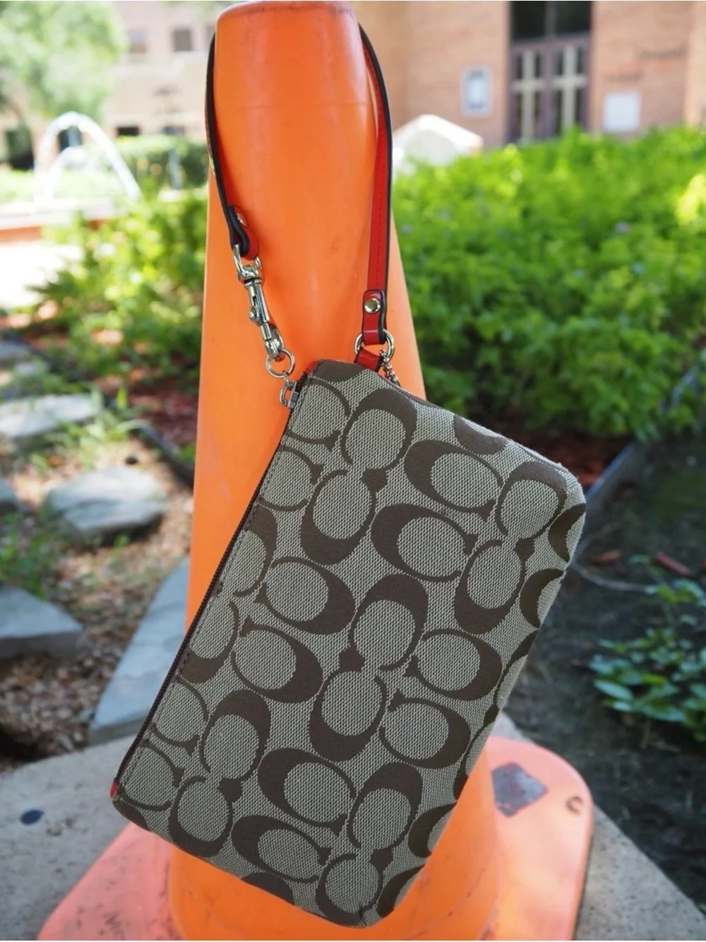 Coach Brown Signature Canvas Wristlet with Red Trim and Orange Tag  EUC